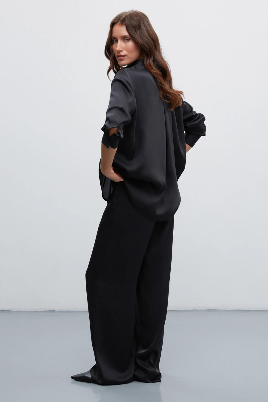 Black satin trousers with pleats