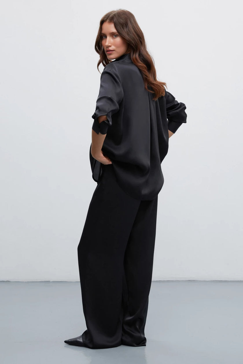 Black satin trousers with pleats