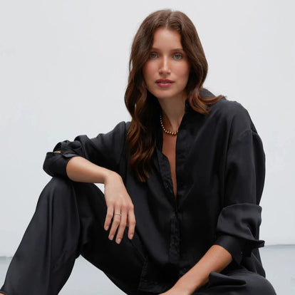 Black satin trousers with pleats
