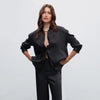 Black satin trousers with pleats
