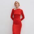 Red midi dress with gathers made of knit fabric.