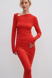 Red midi dress with gathers made of knit fabric.