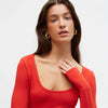 Red knit bodysuit with a round neckline