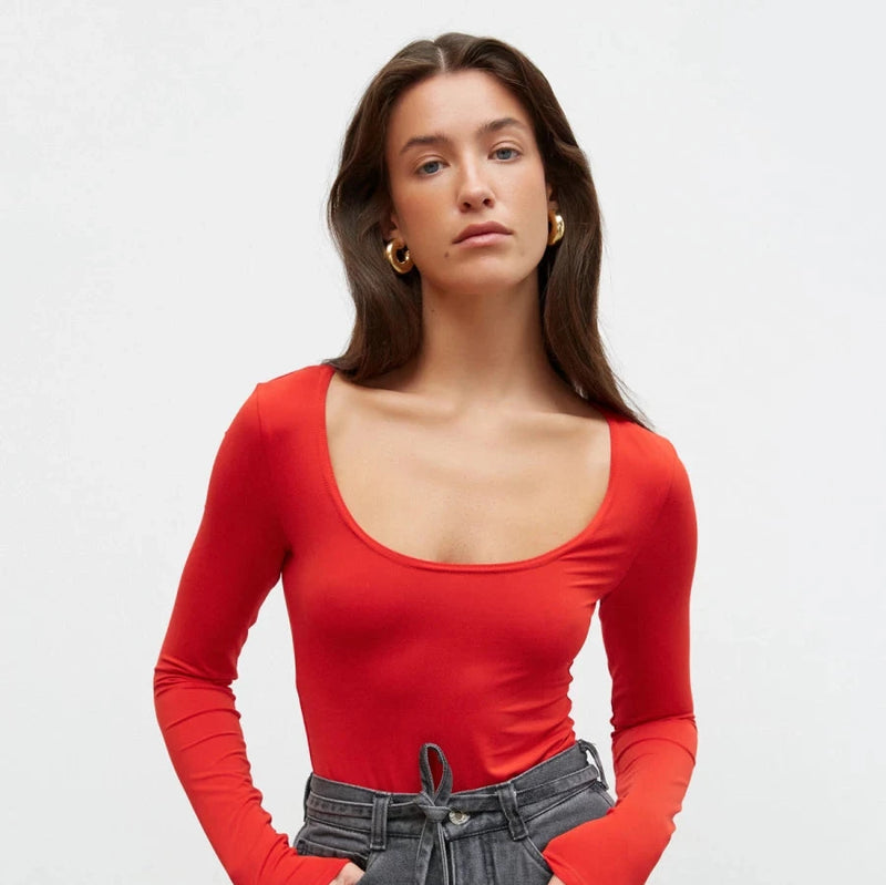 Red knit bodysuit with a round neckline