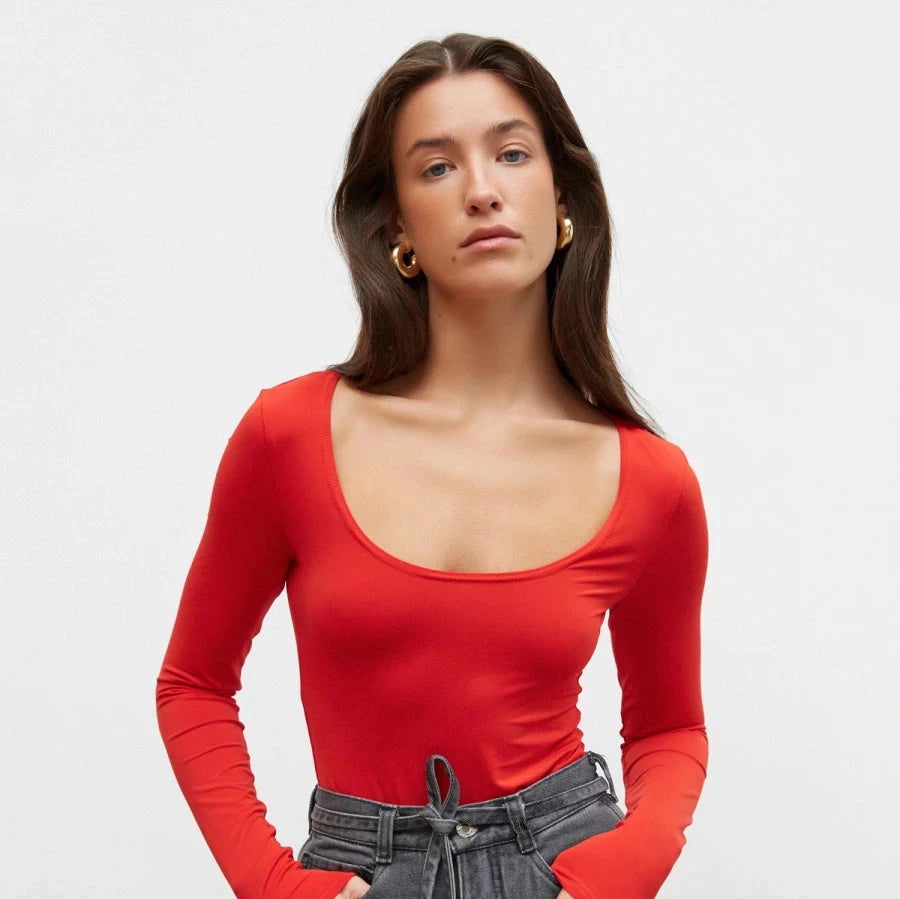 Red knit bodysuit with a round neckline
