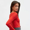Red knitted bodysuit with a round neckline